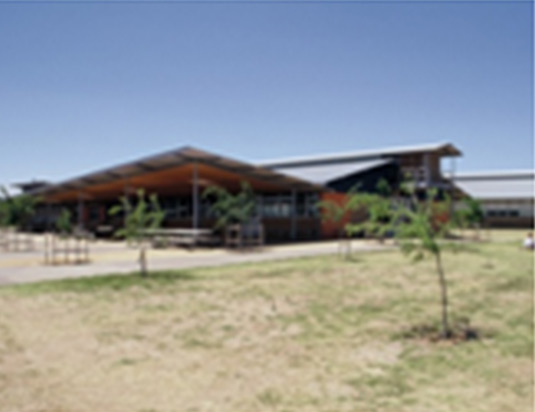 This photo demonstrates a combination of an architectural shade structure and tree planting (once mature), which provides shade. This photo was taken from the Western NSW Region. 