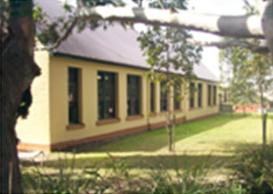 This photo shows an example of a landscape design which is complimentary to the architectural context of the site.